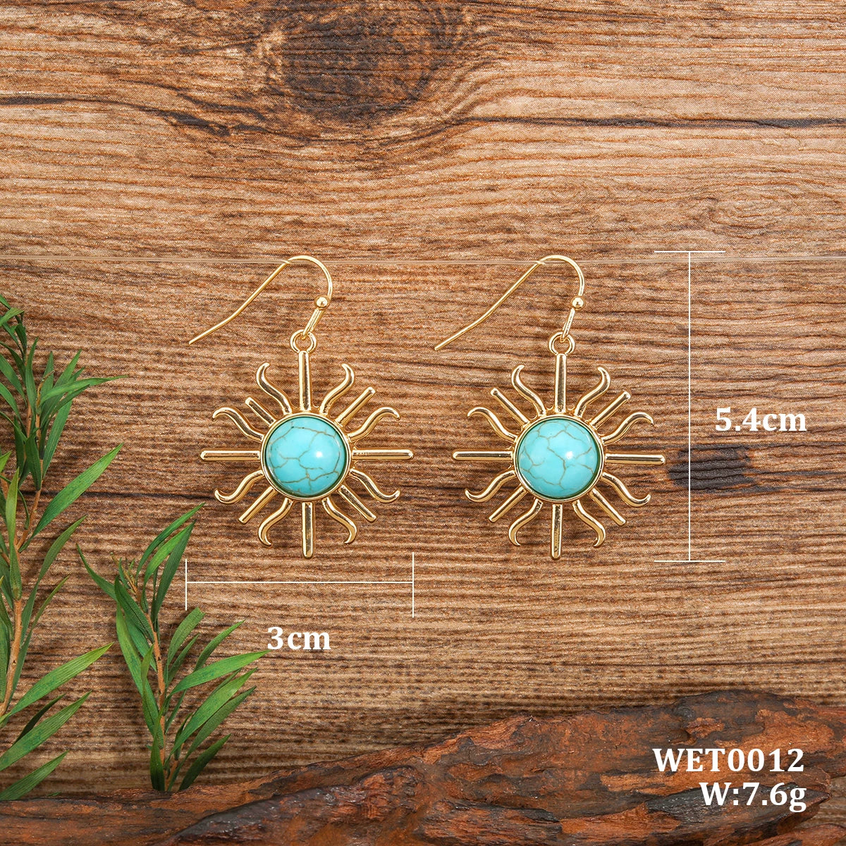 Gouden bohemian oorbellen met turquoise zon