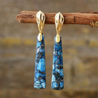 Gouden oorbellen met blauwe jaspis steen