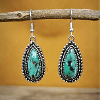 Zilveren bohemian oorbellen met druppel turquoise