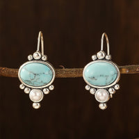 Zilveren vintage oorbellen met turquoise en parel
