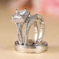 Gouden ringenset met princess-geslepen zirkonia en gevlochten band
