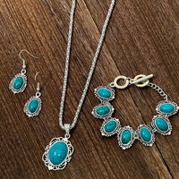 Zilveren sieradenset met turkoois: ketting, oorbellen en armband
