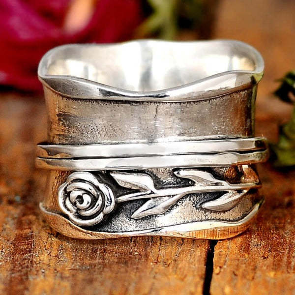 Zilveren vintage roosring met bloemmotief