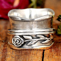 Zilveren vintage roosring met bloemmotief