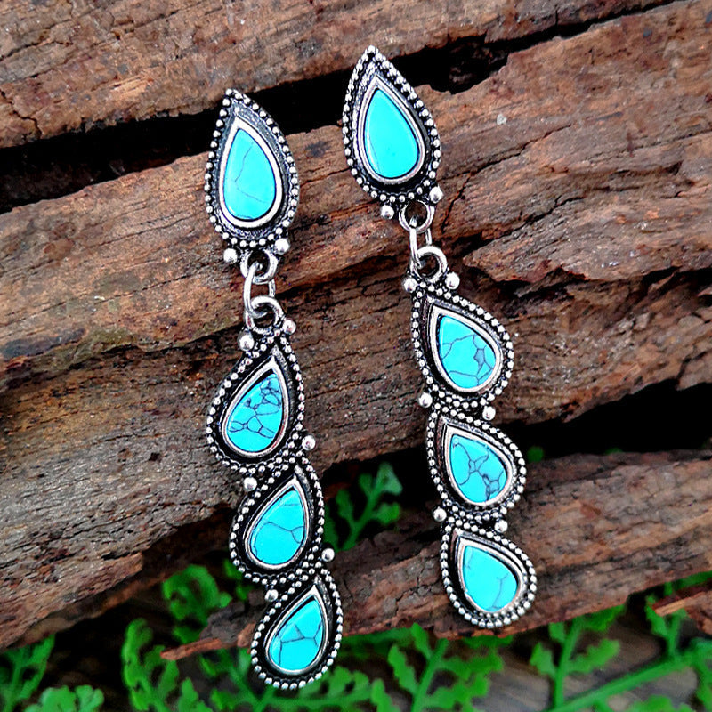 Zilveren bohemian oorbellen met turquoise druppels
