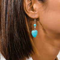 Zilveren oorbellen met turquoise hart