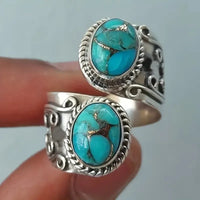 Zilveren vintage wikkelring met turquoise stenen