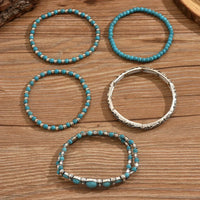 Zilveren bohemian armbandenset met turquoise kralen