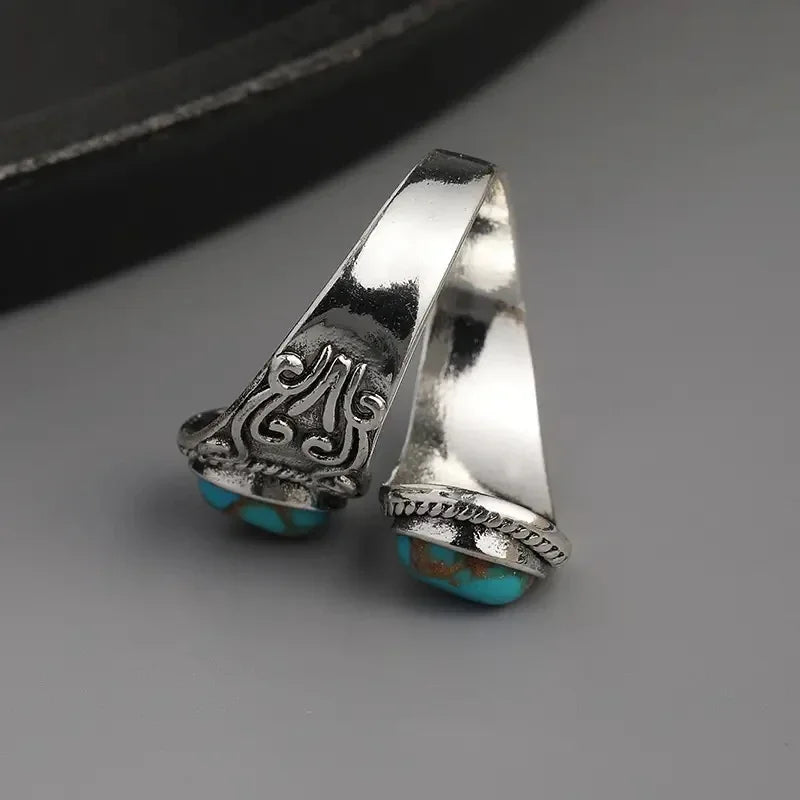 Zilveren vintage wikkelring met turquoise stenen