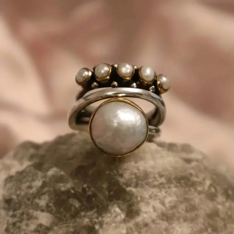Zilveren ring met parel en parelkroon