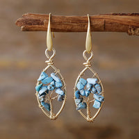 Zilveren vintage filigrein oorbellen met blauwe en gele edelsteen