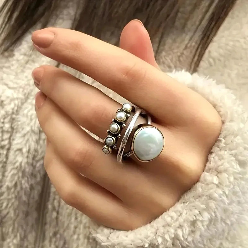 Zilveren ring met parel en parelkroon