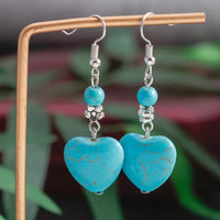 Zilveren oorbellen met turquoise hart