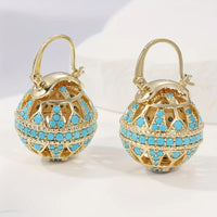 Gouden bolhanger-oorbellen met turquoise kralen