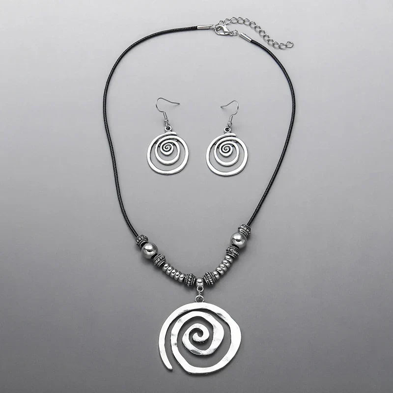Zilveren bohemian spiraal set met ketting en oorbellen
