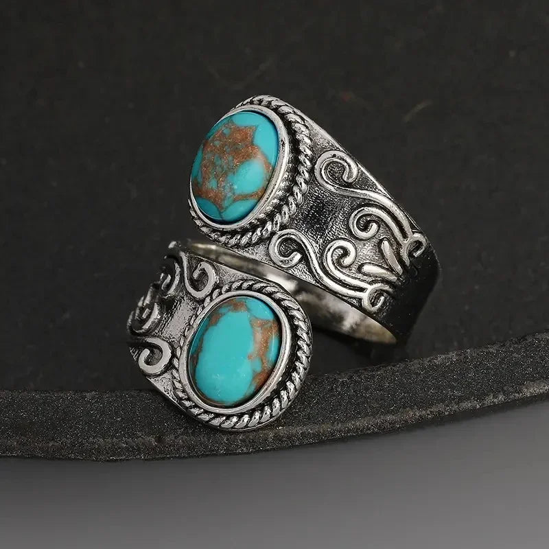 Zilveren vintage wikkelring met turquoise stenen
