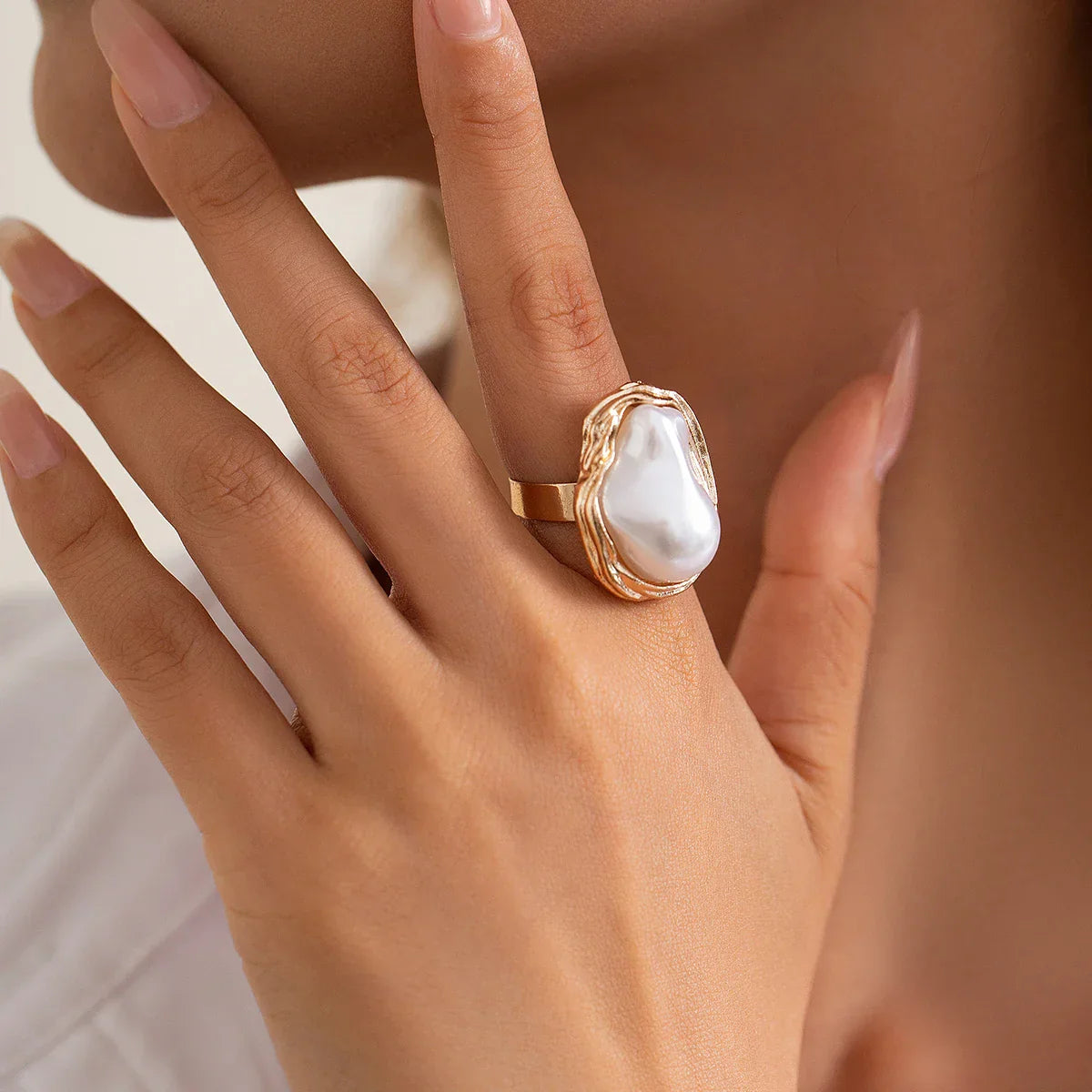Gouden ringenset met barokparels
