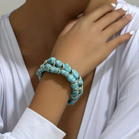 Bohemian ring met turquoise kralen