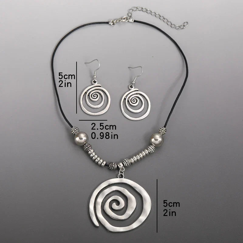 Zilveren bohemian spiraal set met ketting en oorbellen