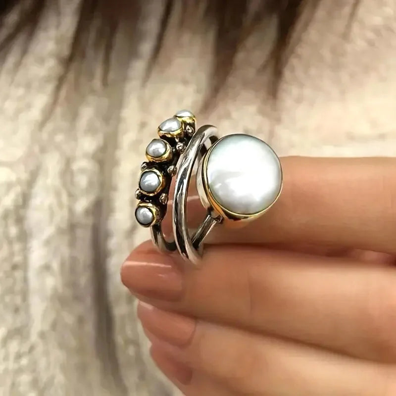 Zilveren ring met parel en parelkroon