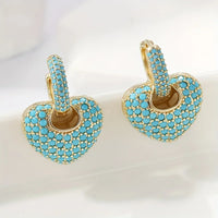 Gouden hart-oorbellen met turquoise pavé