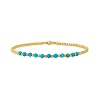 Set van turquoise en gouden kralenarmbanden