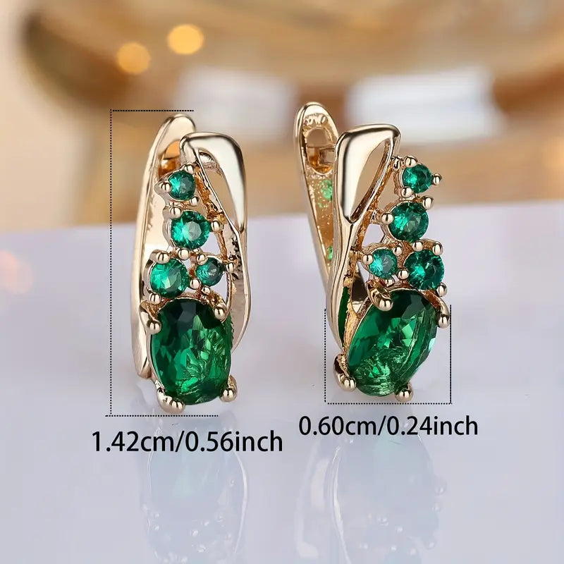 Gouden oorbellen met groene edelstenen