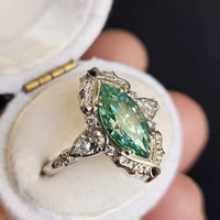 Zilveren vintage ring met groene marquise edelsteen