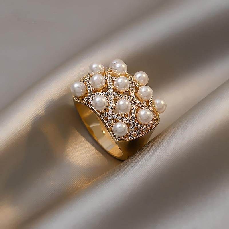 Gouden ring met parels en zirkonia