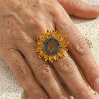 Gouden zonnebloemring met zirkonia
