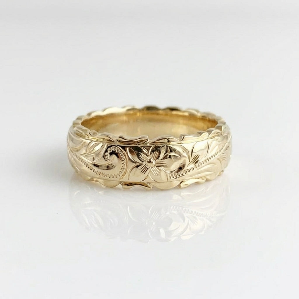 Gouden vintage ring met gegraveerd bloemmotief