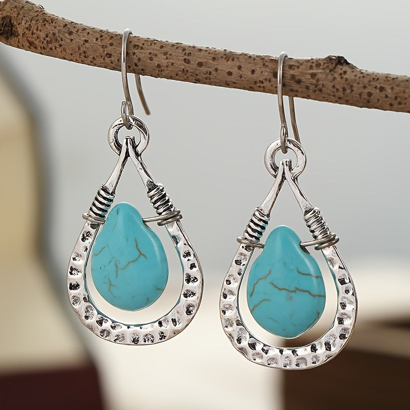 Zilveren oorbellen met wire-wrapped turquoise druppel