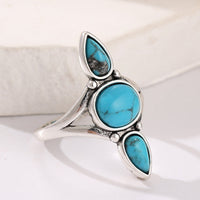 Zilveren ring met drie turquoise edelstenen