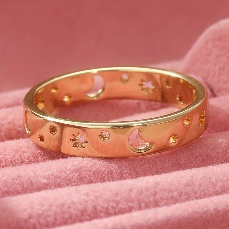 Gouden ringenset met zon, maan en sterren