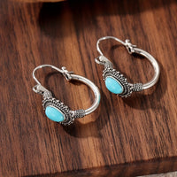 Bohemian ketting met turquoise kralen en druppelhanger