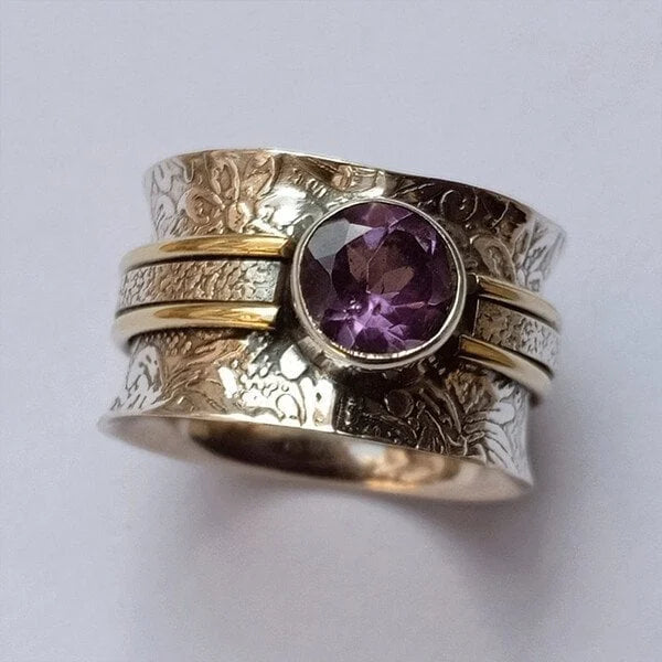 Zilveren spinner ring met amethist