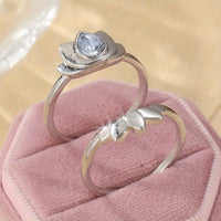 Zilveren lotusring met druppelvormige blauwe steen