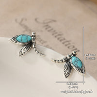 Zilveren oorbellen met libelle en turquoise