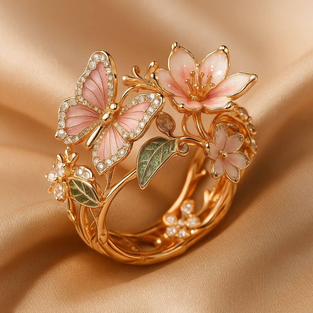 Roségouden ring met roze vlinder en bloemen