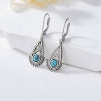 Zilveren vintage filigraan oorbellen met turquoise druppel