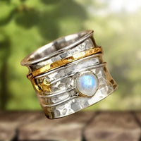 Zilveren en gouden brede ring met maansteen
