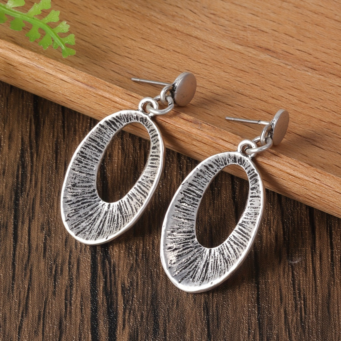 Zilveren ketting- en oorbellenset met gelaagde ovale hanger