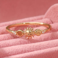 Gouden ringenset met zon, maan en sterren