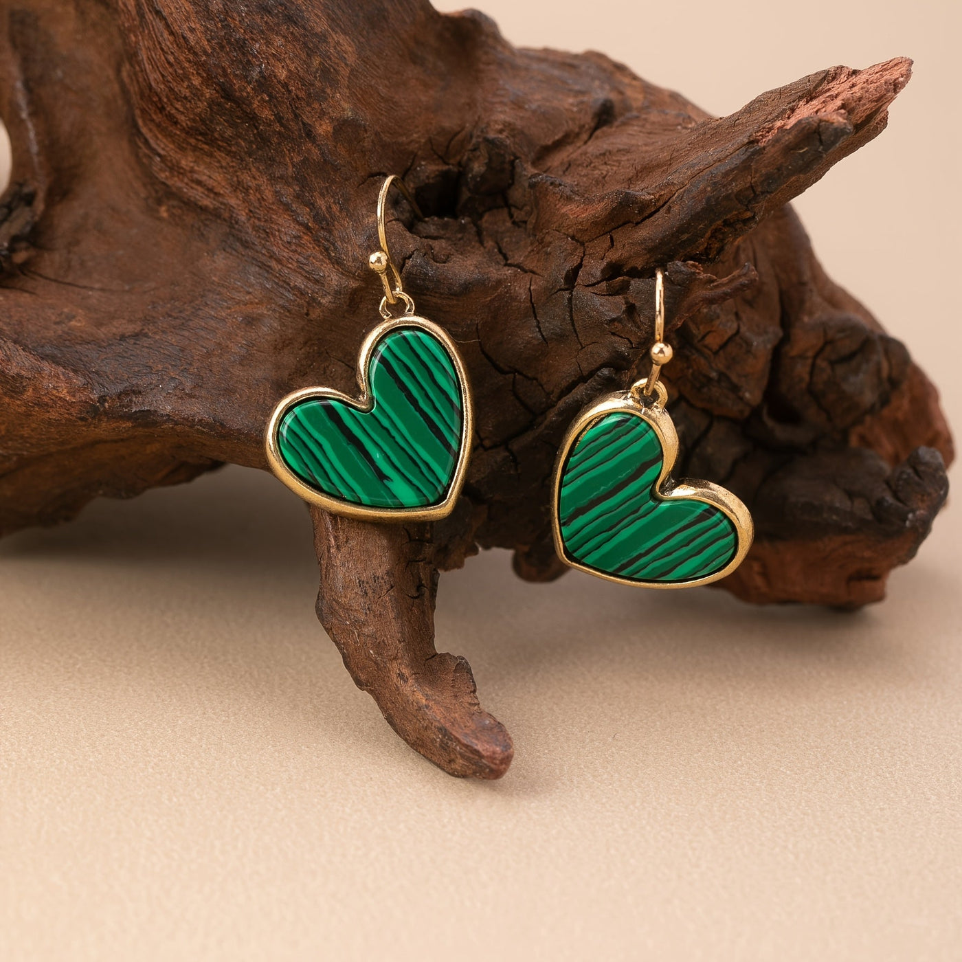 Gouden oorbellen met turquoise hart