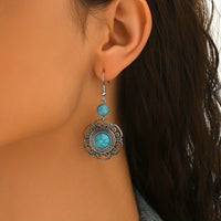 Zilveren bohemian oorbellen met filigraan en turquoise