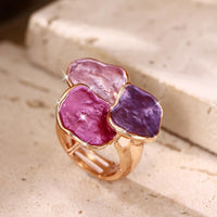 Roségouden ring met roze en paarse edelstenen