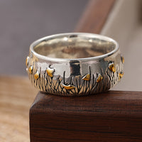 Zilveren vintage ring met gouden vogels en bladeren