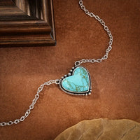 Zilveren tribale oorbellen met turquoise druppels