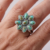 Zilveren ring met turquoise bloemcluster