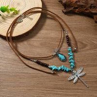 Bohemian dubbellaagse ketting met turkooizen kralen en libelle